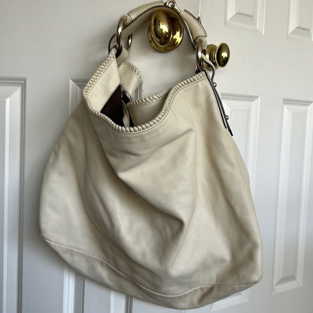 Gucci large hobo style purse w gold hardware inside is immaculate